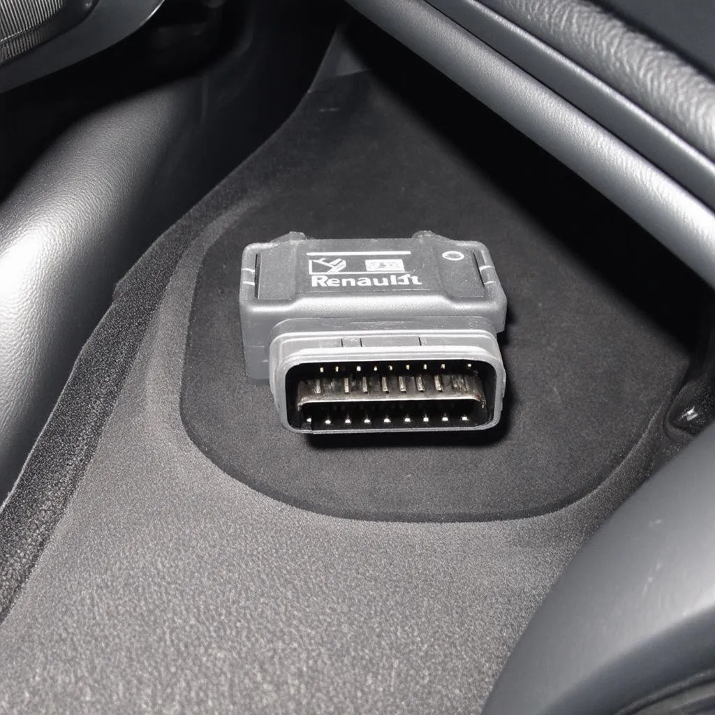 Emplacement de la prise OBD dans une Renault Laguna 2005