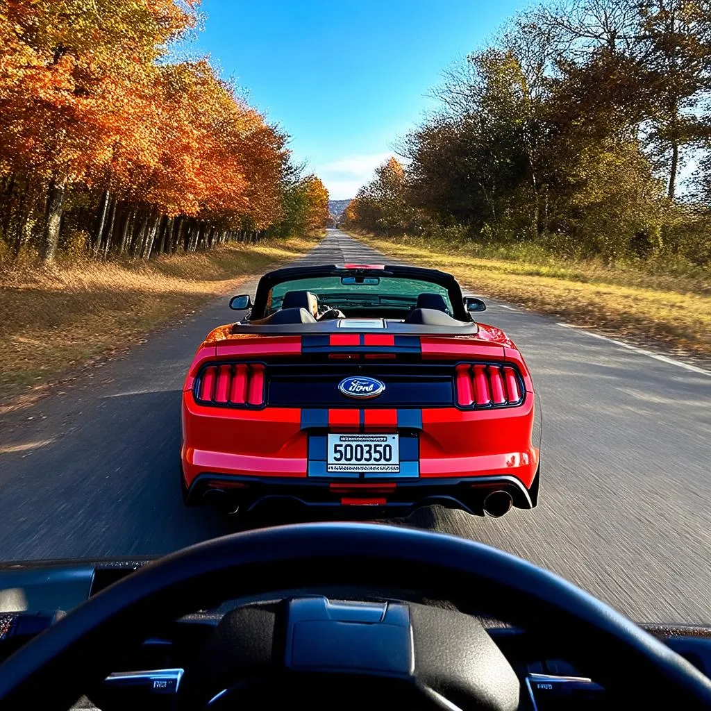 Ford Mustang Shelby GT500 sur une route de campagne