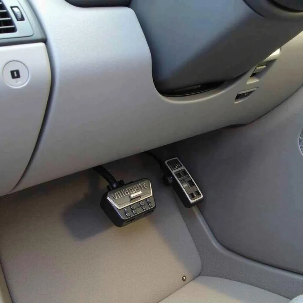 Emplacement du port OBD sur une Passat 2003