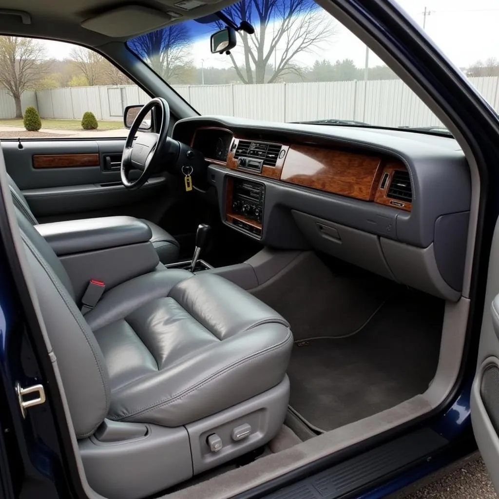 Habitacle de la Lincoln Town Car 1997 avec intérieur en cuir beige