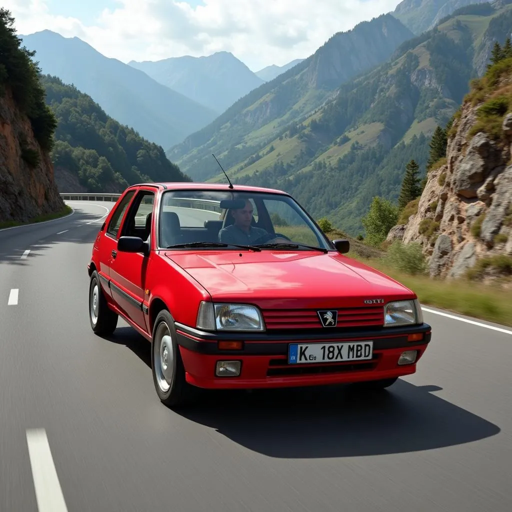 Peugeot 205 GTI rouge sur une route de montagne sinueuse