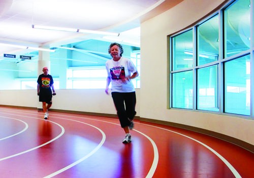 Group exercise class participants with instructor